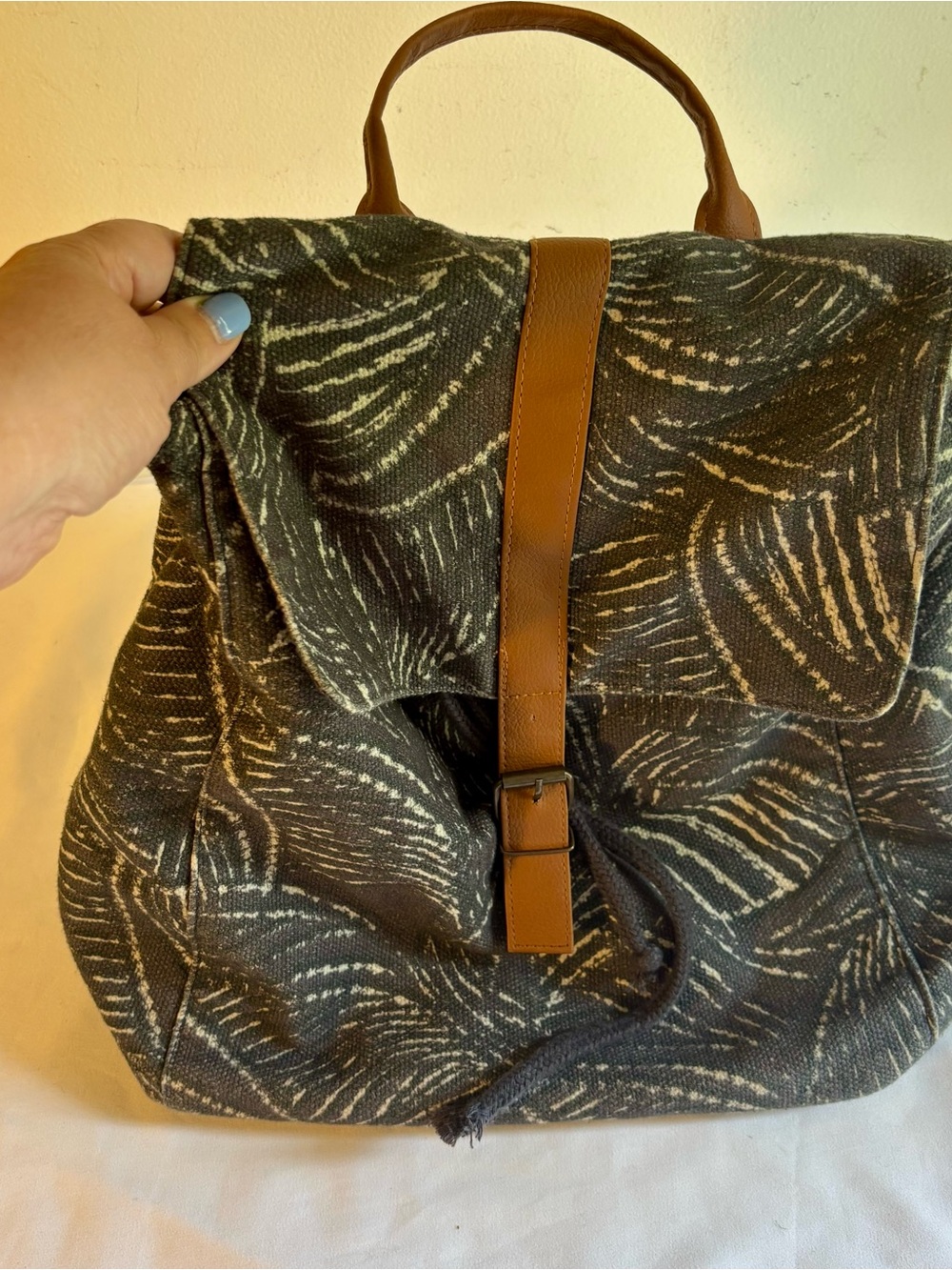 Lu & Elle "The Paradise Palm" backpack in gray with a white leaf pattern